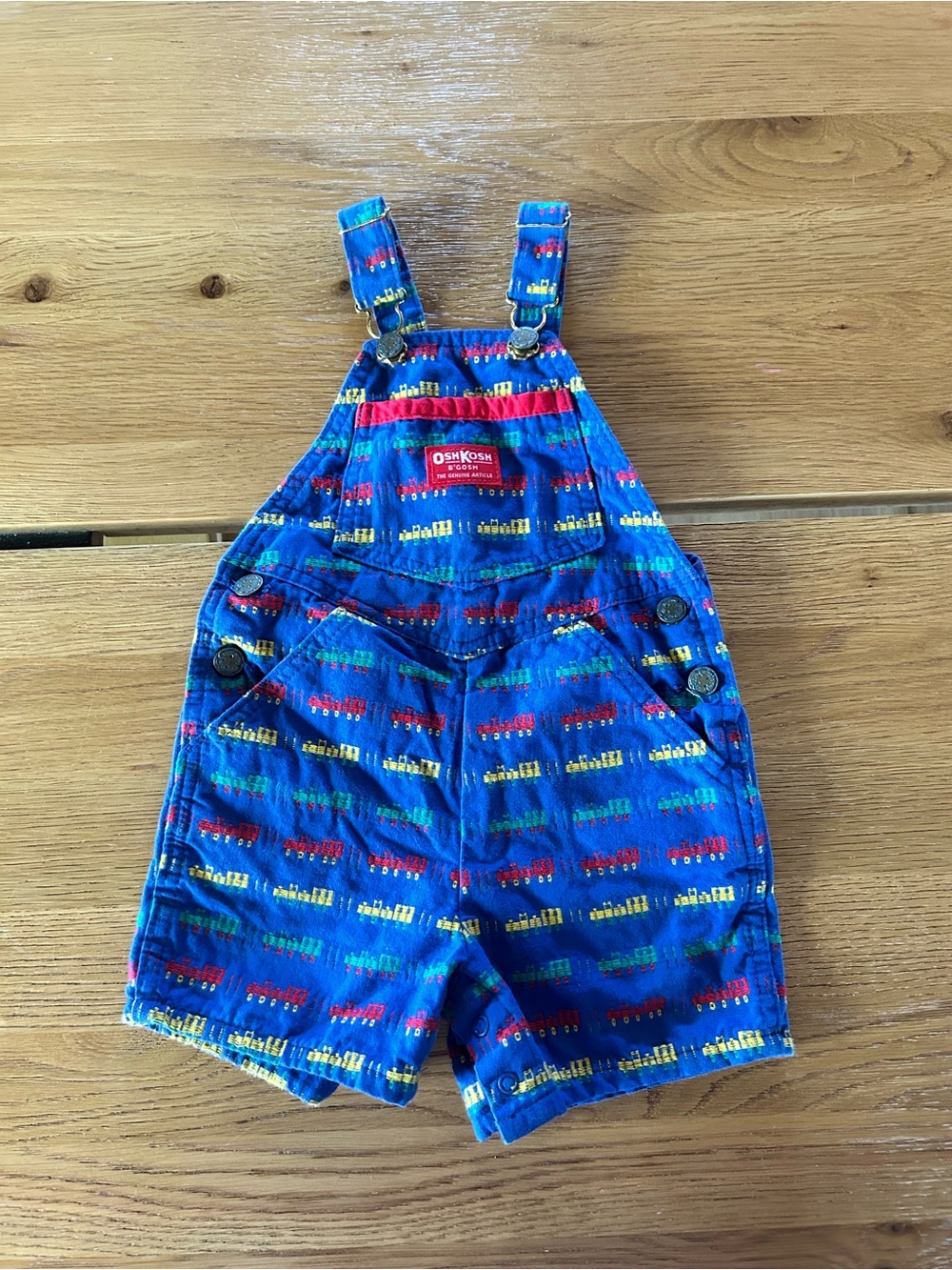 Vintage OshKosh B'gosh Bright Blue Train-Print Shortalls